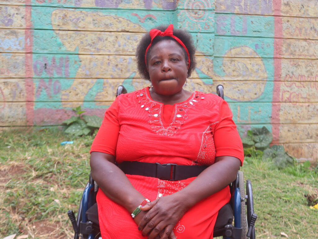 Teresia Wanjiku, a middle-aged wheelchair user