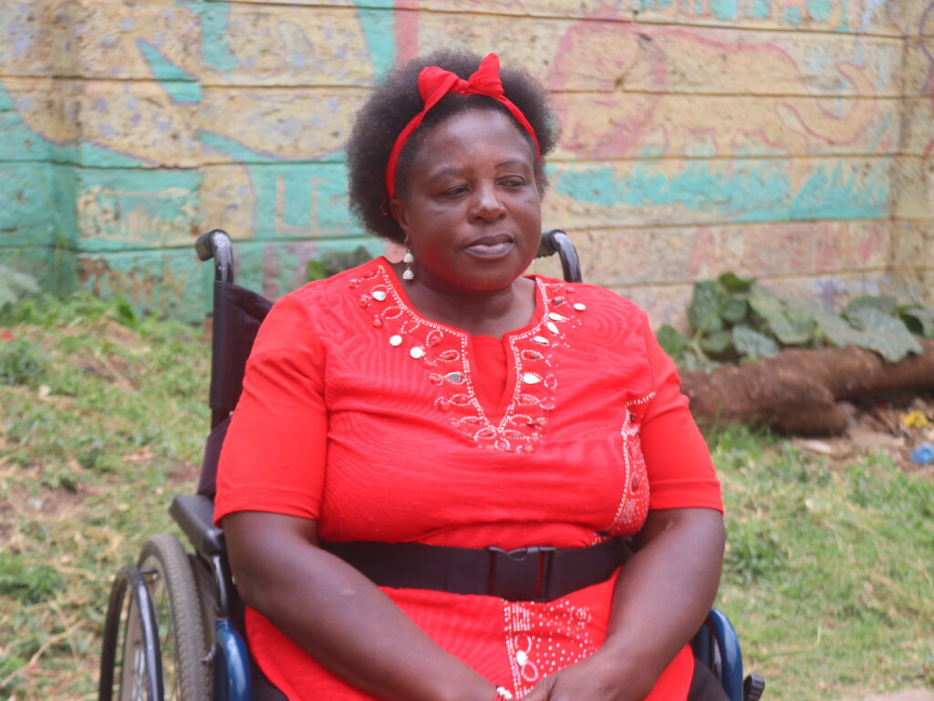 Teresia Wanjiku, a middle-aged wheelchair user
